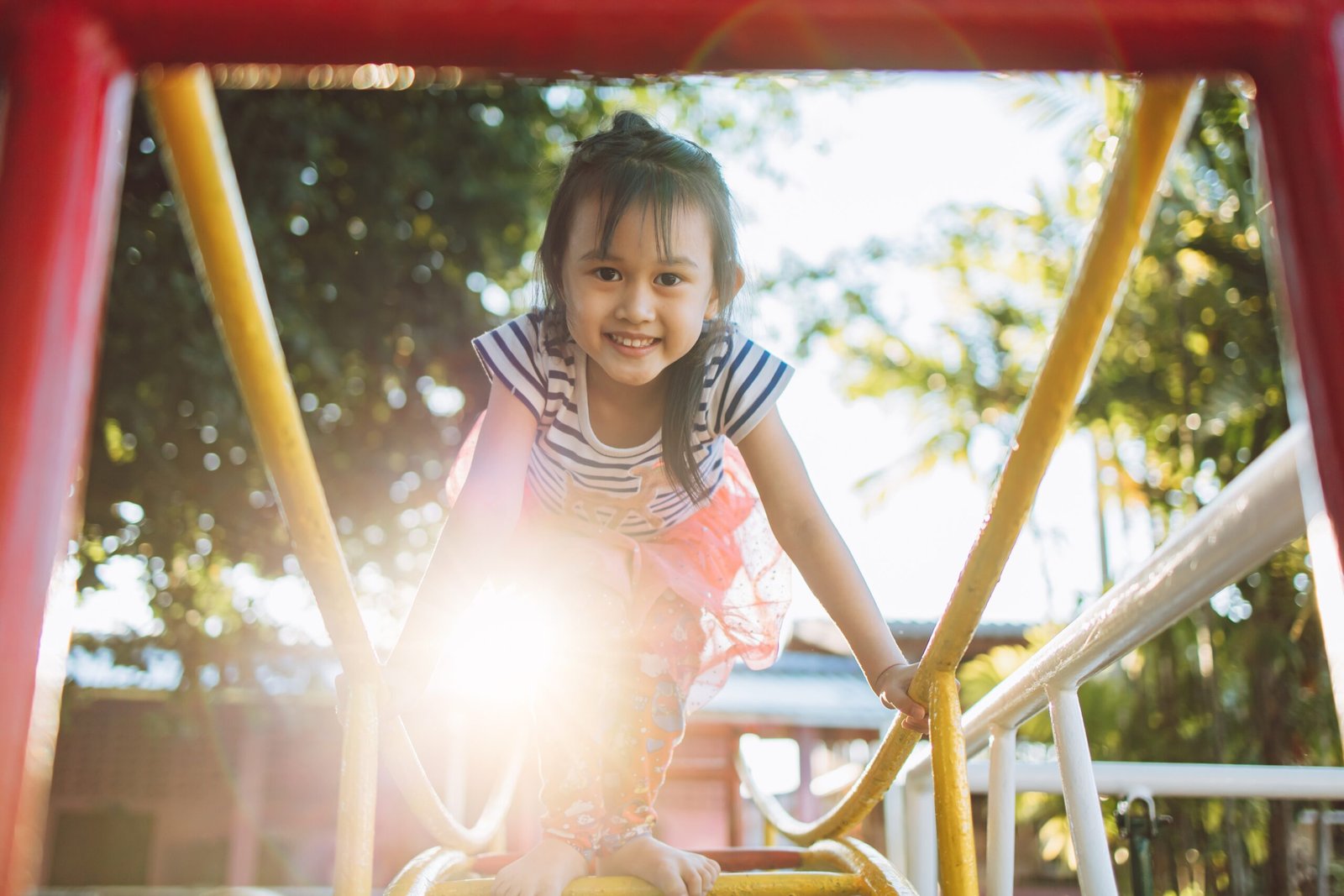 kid-play-at-the-playground-in-the-park-2022-11-10-18-37-45-utc